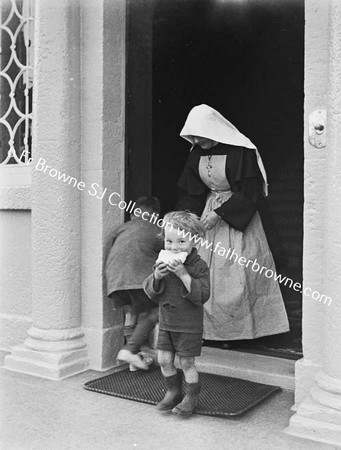 SISTER CORA (MT STANNE'S MILLTOWN),WITH POOR CHILDREN